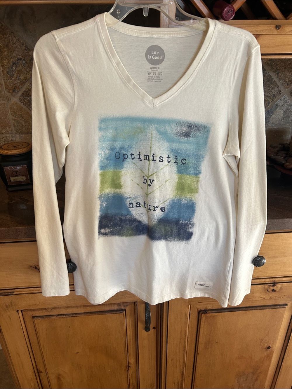 Life Is Good Cream V‑Neck Long Sleeve Tee with Blue & Green Graphic